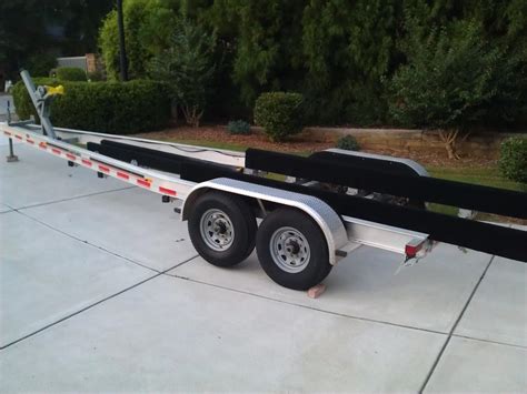 Magic tilt trailer tire mount